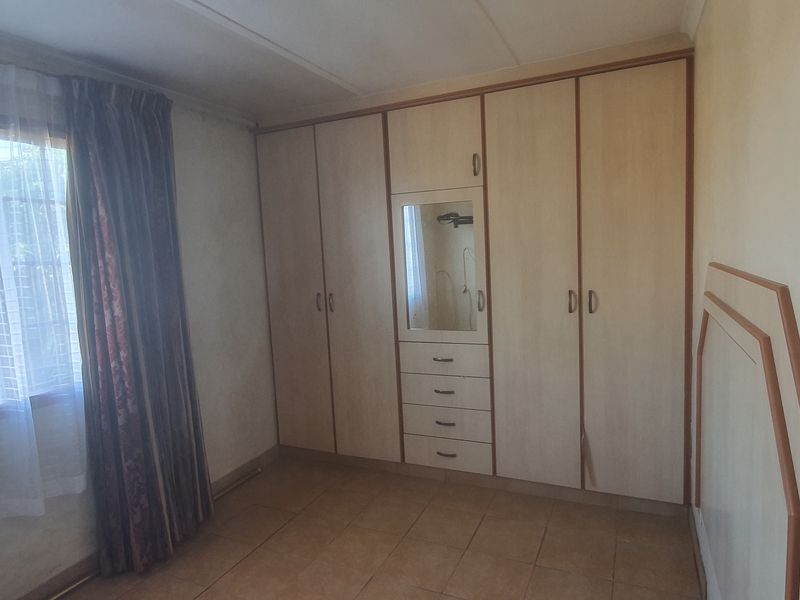 Three Bedroom Corner Property with Huge Yard and Two Road Access - Photo 9