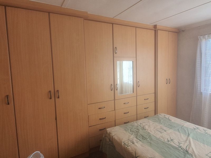 Three Bedroom Corner Property with Huge Yard and Two Road Access - Photo 8