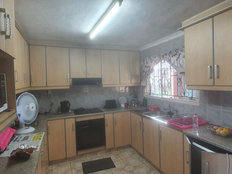 Three Bedroom Corner Property with Huge Yard and Two Road Access - Photo 7