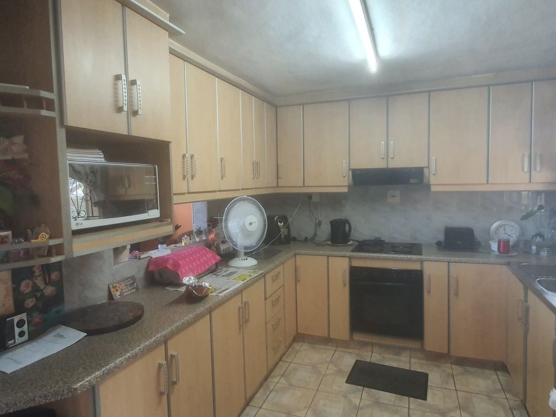 Three Bedroom Corner Property with Huge Yard and Two Road Access - Photo 6