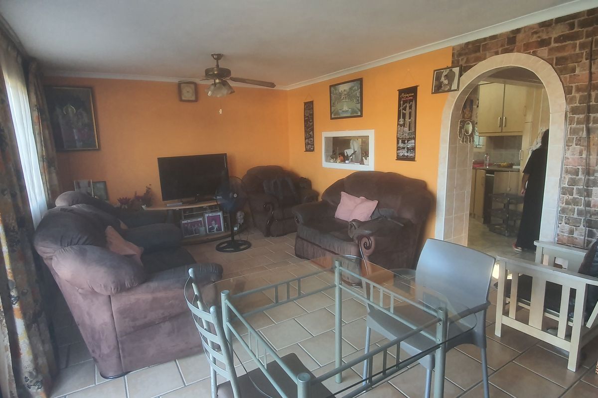 Three Bedroom Corner Property with Huge Yard and Two Road Access - Photo 5