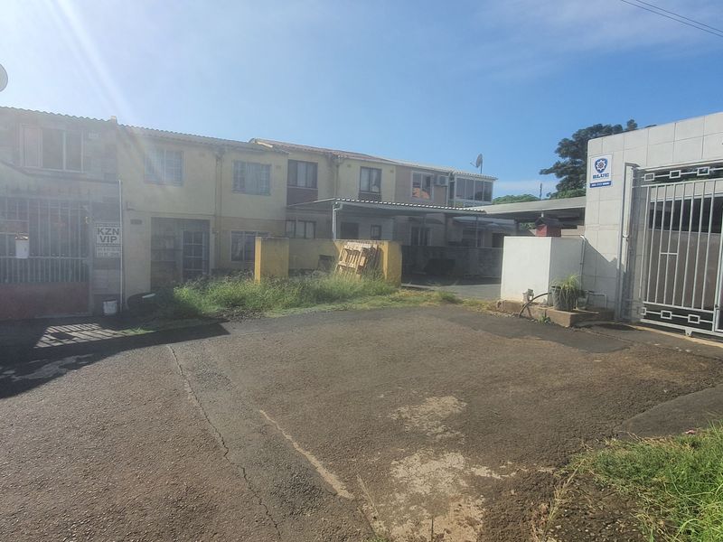 Three Bedroom Duplex Above Road Level and Spacious Yard in Greenbury For Sale - Photo 1
