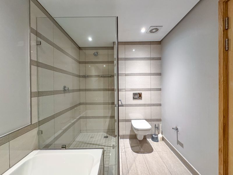 Luxury Coastal Living | Spacious 3 Bed 3 Bath Apartment at Pearls - Photo 10