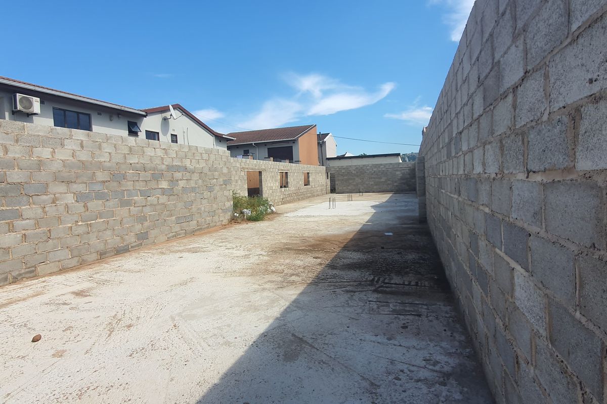 Unlock Possiblities - Versetile Vacant Land Ideal for Homes or Commercial Use - Photo 2