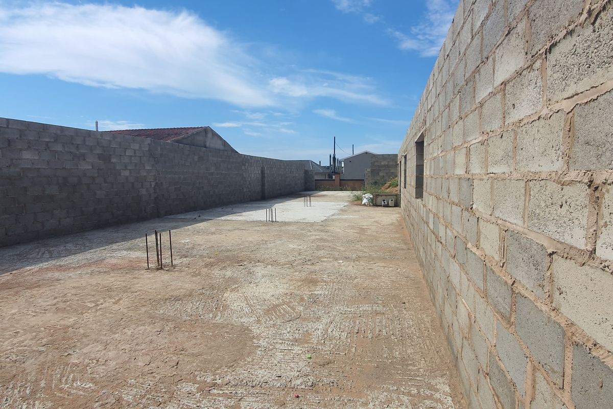 Unlock Possiblities - Versetile Vacant Land Ideal for Homes or Commercial Use - Photo 3