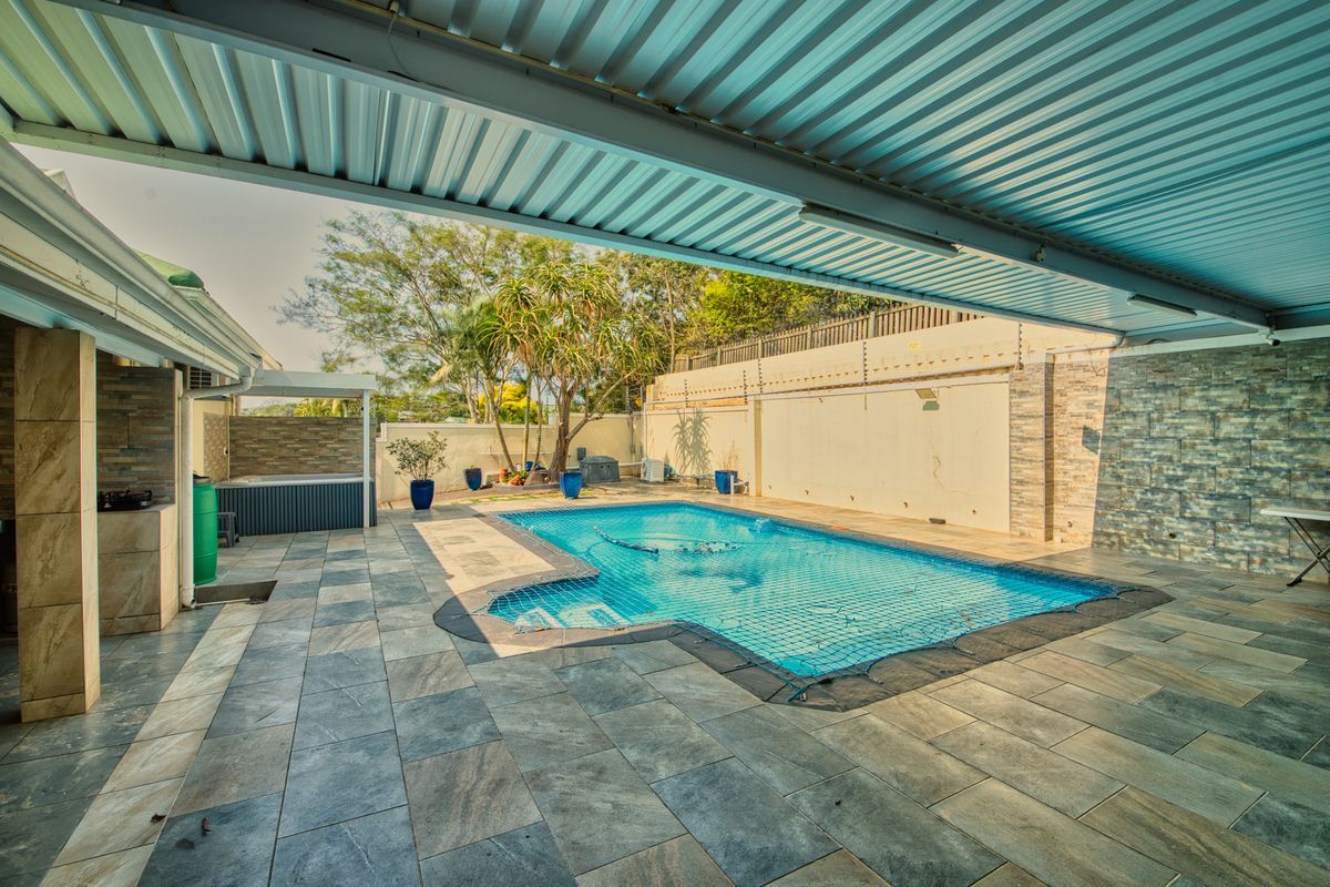 Live The Luxury Lifestyle in This 4 Bedroom Home including a Pool and Entertainment Section - Photo 3