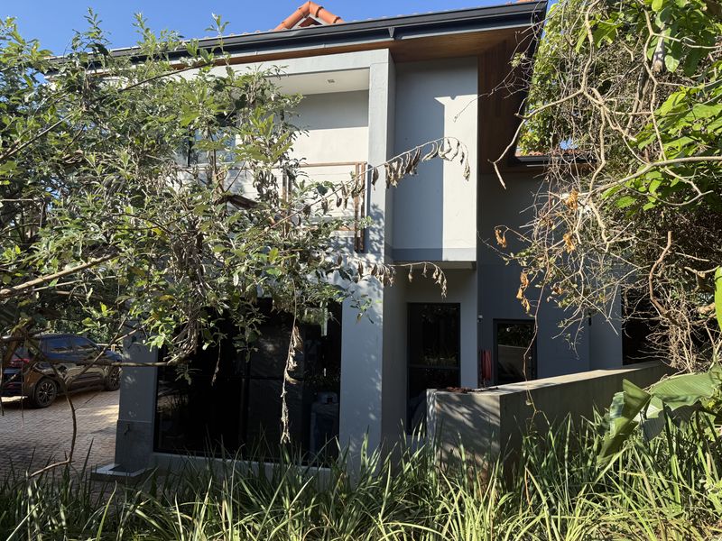 Stunning 5 Bedroom Freestanding Home in Zimbali Coastal Estate - Photo 1