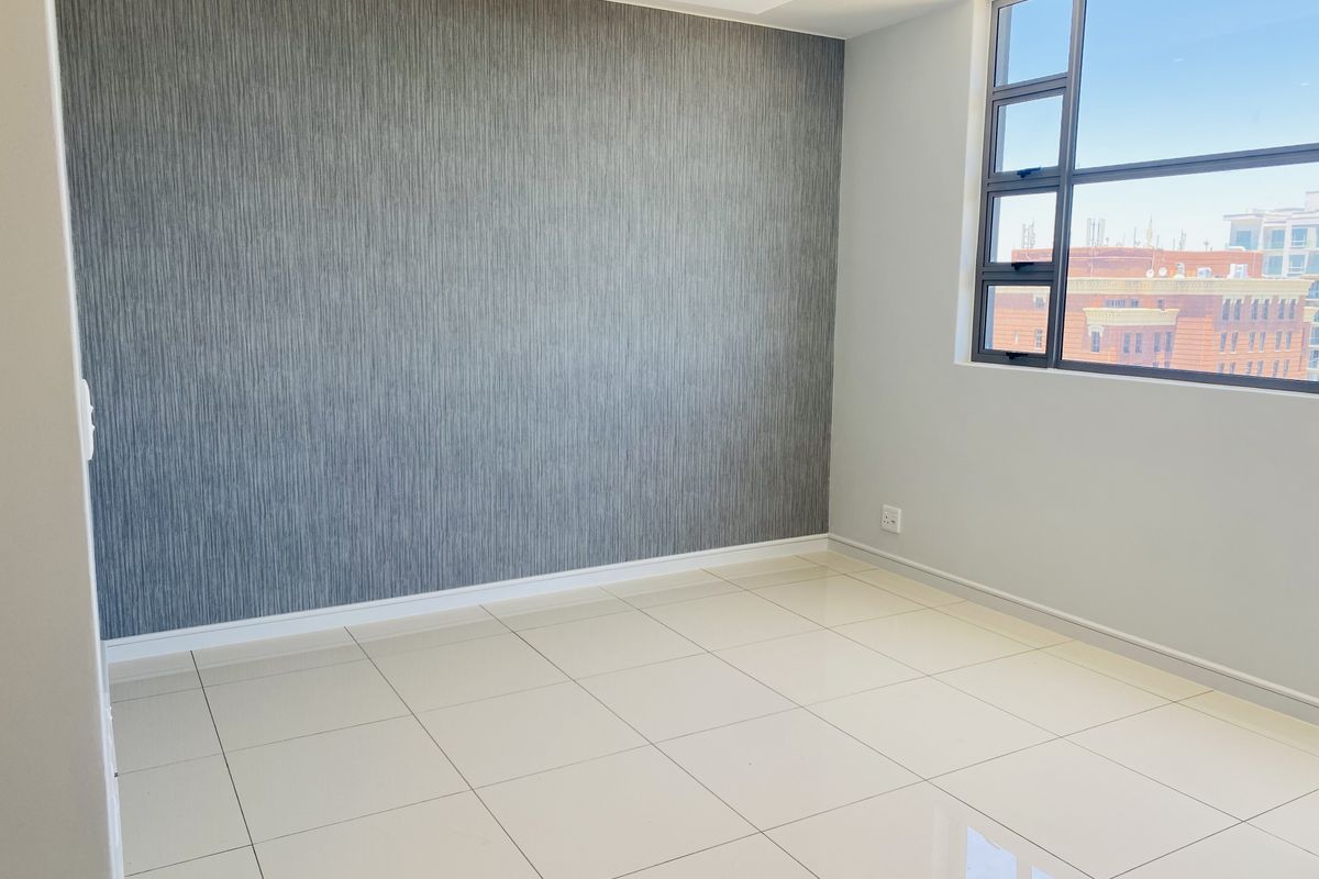 Sophisticated 1 Bedroom Apartment on the 10th Floor - Photo 4