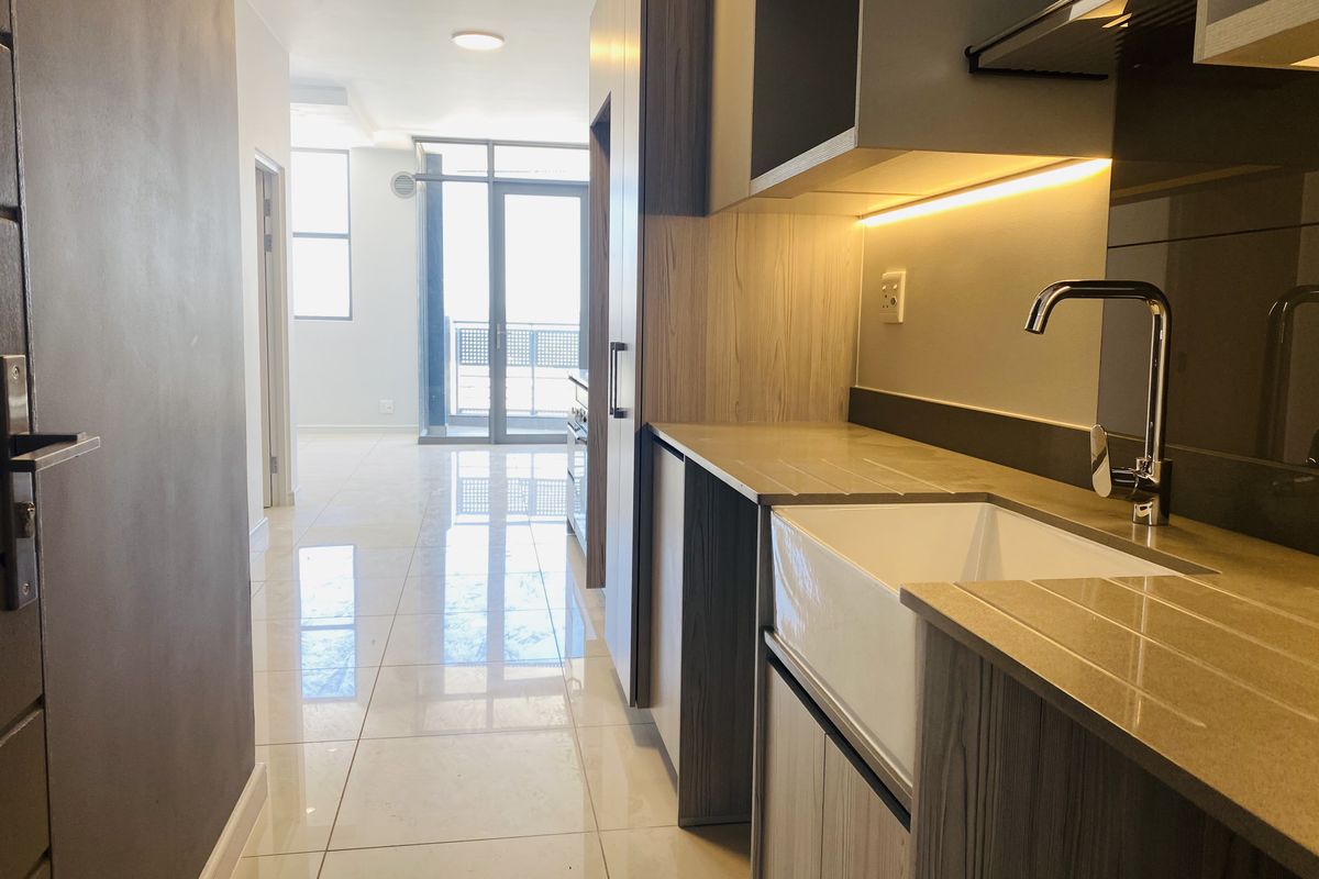 Sophisticated 1 Bedroom Apartment on the 10th Floor - Photo 2