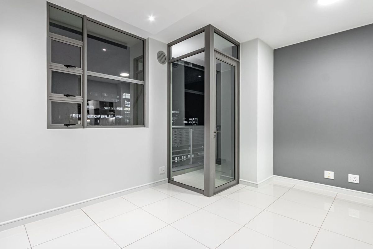 Modern Luxury Living. 1 Bed 1 Bath. Off-The-Grid. 2 Minute walk to Gautrain Station - Photo 3