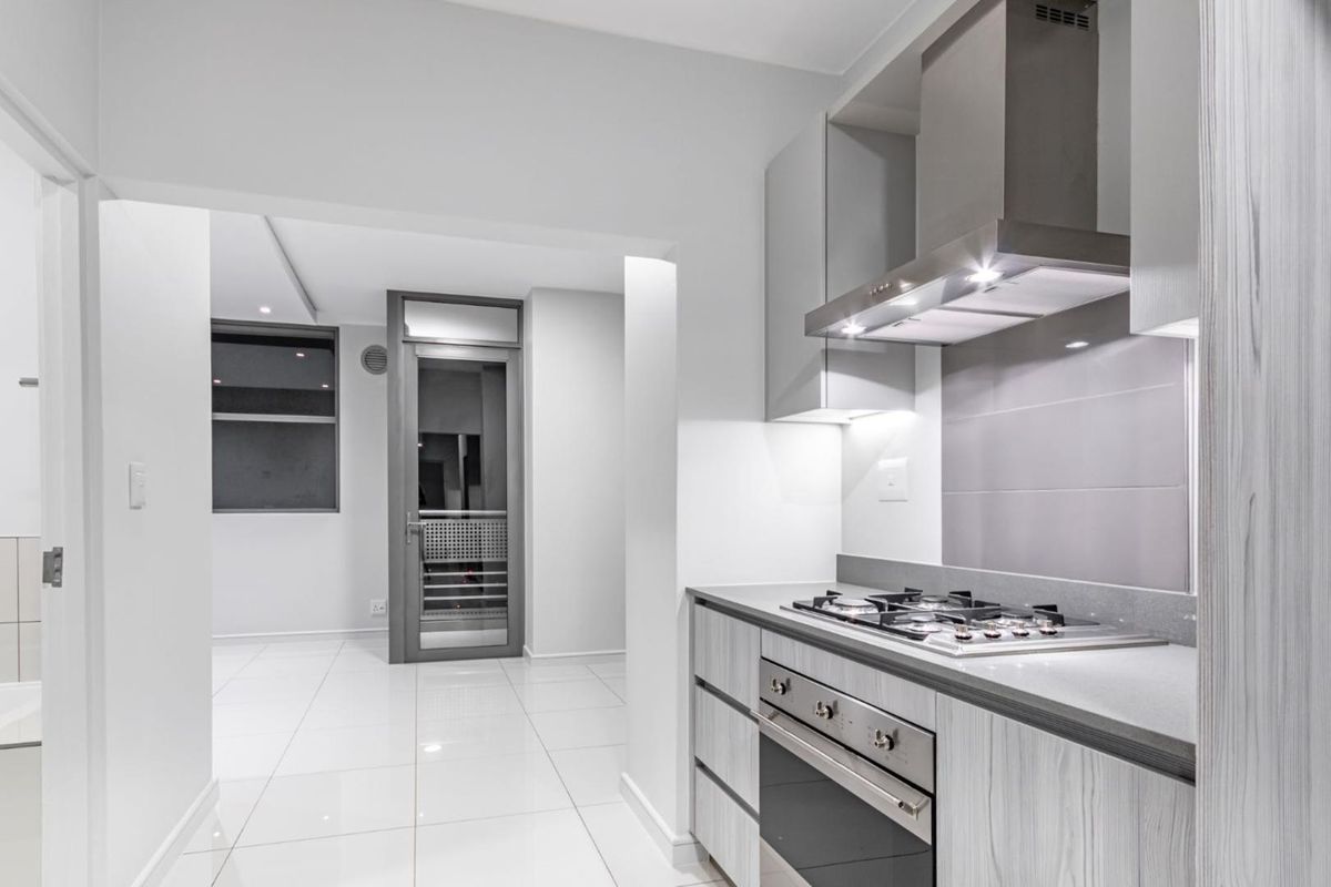 Modern Luxury Living. 1 Bed 1 Bath. Off-The-Grid. 2 Minute walk to Gautrain Station - Photo 5