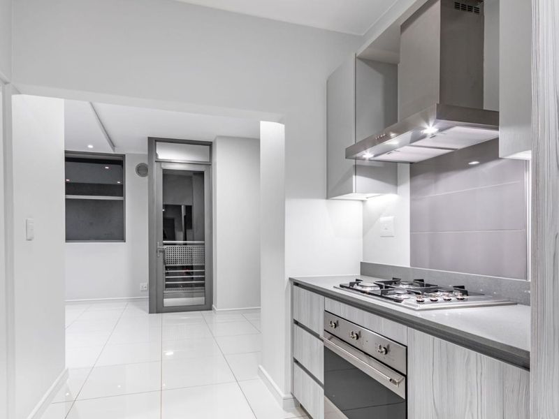 Modern Luxury Living. 1 Bed 1 Bath. Off-The-Grid. 2 Minute walk to Gautrain Station - Photo 5