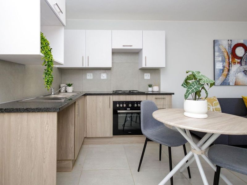 Superbly Positioned in Rivonia is a Spacious 2 Bed 1 Bath Apartment - Photo 2