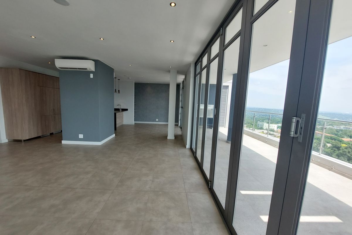 Well-designed 3 Bedroom Penthouse Offering Some of the Best Views in Jhb. - Photo 2