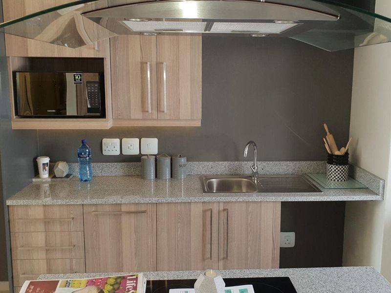 Ultra Modern 2 Bedroom 2 Bathroom Apartment in Rivonia - Photo 9