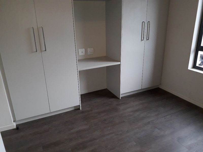 A north facing 2 bedroom 1 bathroom apartment available in Rivonia - Photo 10