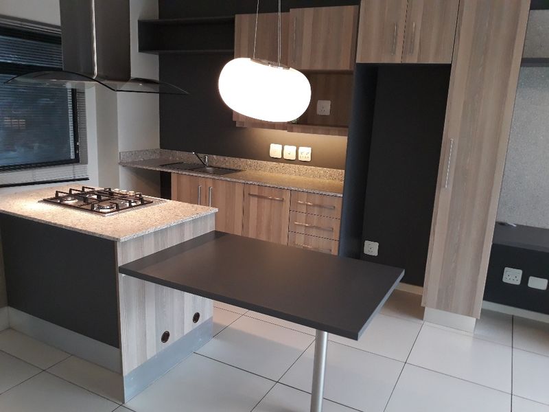 A north facing 2 bedroom 1 bathroom apartment available in Rivonia - Photo 5