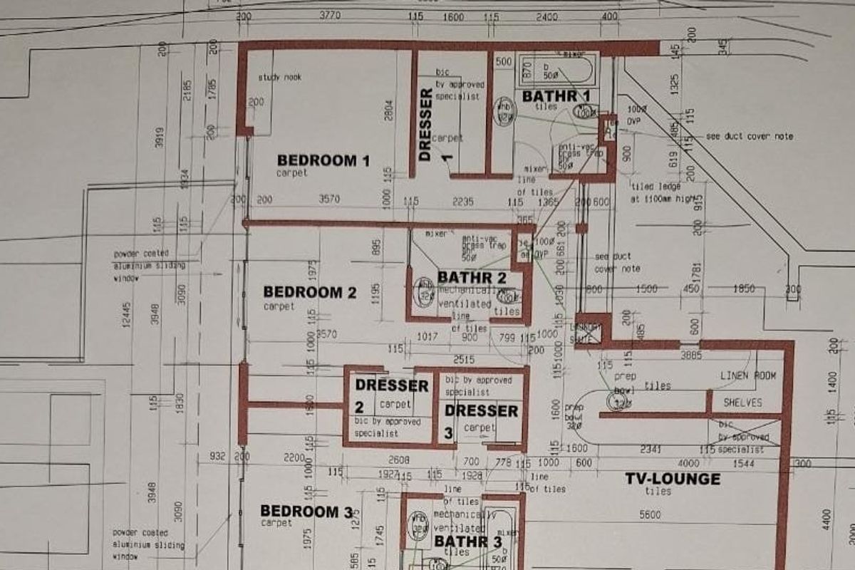 Architectural floor plan detailing the layout of bedrooms, bathrooms, dressing areas, and a TV lounge.