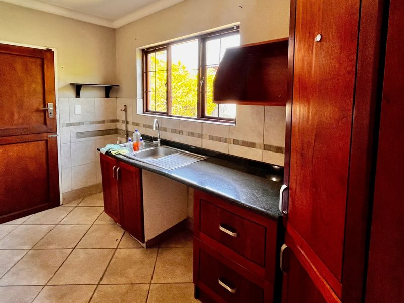 Modern 3-Bedroom Townhouse in Secure Waterval East Estate - Photo 6