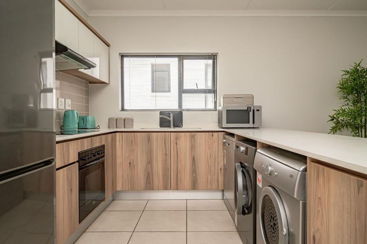 Funky, Modern 2-Bedroom Apartment for Sale in The Reid Lifestyle Estate - Photo 3