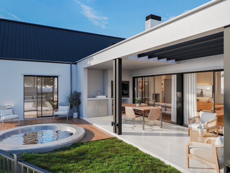 Modern rear exterior featuring a covered patio with built-in braai, a circular plunge pool, and seamless indoor-outdoor flow through large sliding glass doors.