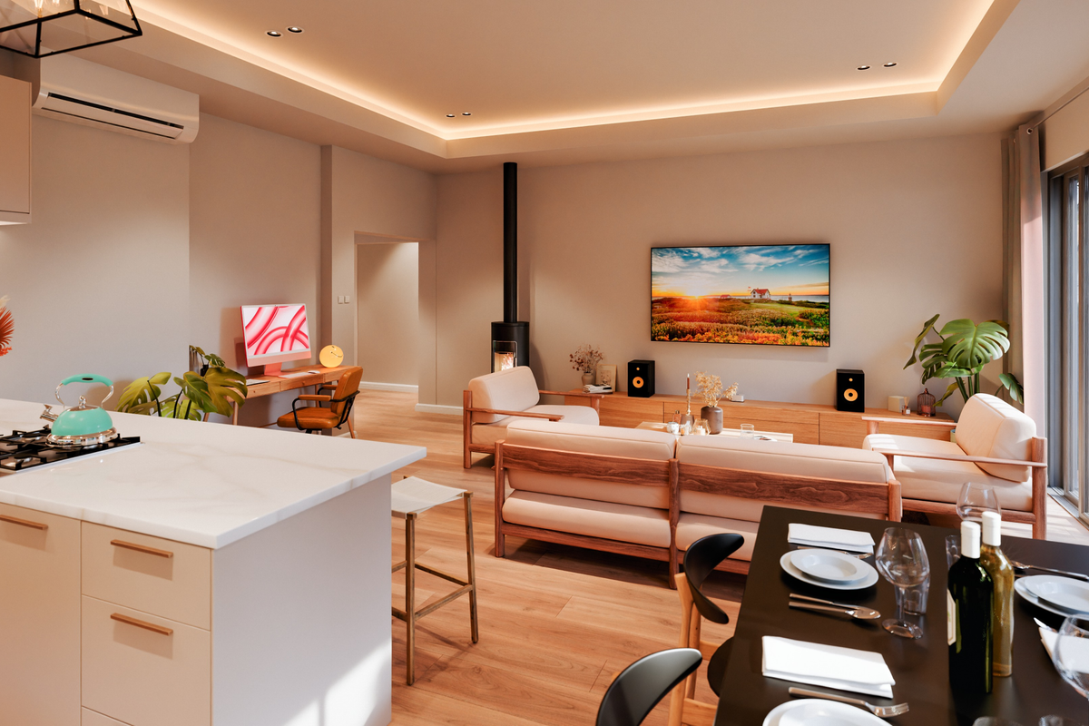 Modern open-plan living area featuring a sleek kitchen island, integrated appliances, a cozy fireplace, and seamless access to the outdoor space via sliding doors.