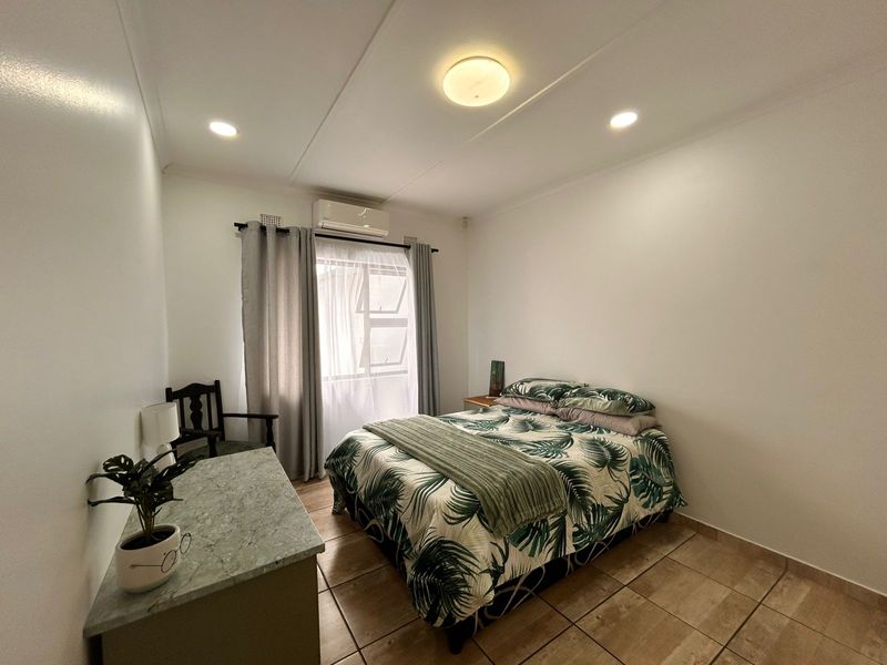 Beautiful Family Home with Entertainment Area and Pool in the Heart of Veld en Vlei - Photo 6