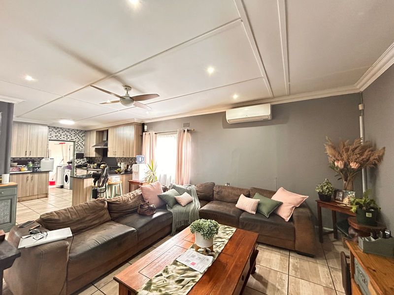 Beautiful Family Home with Entertainment Area and Pool in the Heart of Veld en Vlei - Photo 2