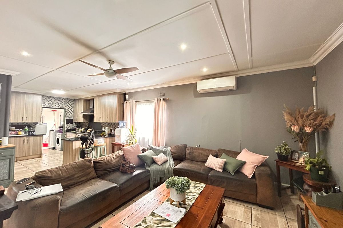 Beautiful Family Home with Entertainment Area and Pool in the Heart of Veld en Vlei - Photo 2