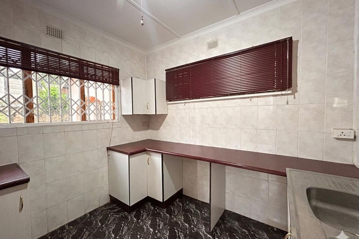 Spacious Family Home with Granny Flat  Perfect for Investment or Extended Family Living - Photo 2