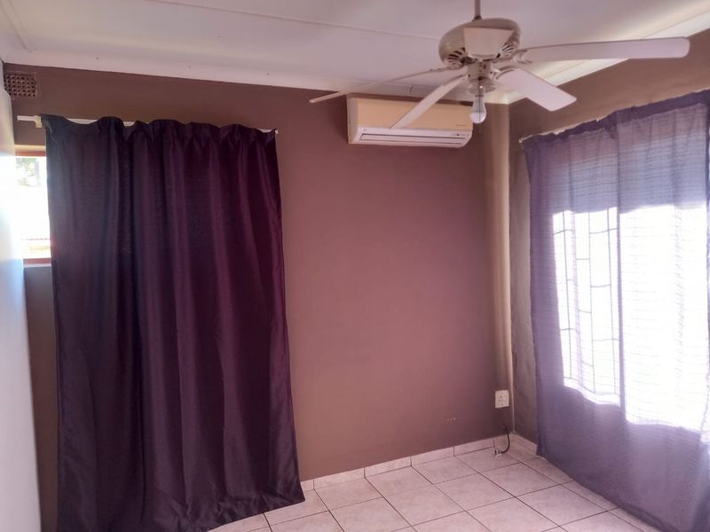 Spacious Family Home with Additional Flatlet and Expansion Potential - Photo 9