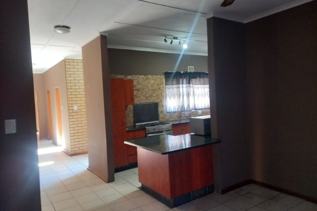 Spacious Family Home with Additional Flatlet and Expansion Potential - Photo 4