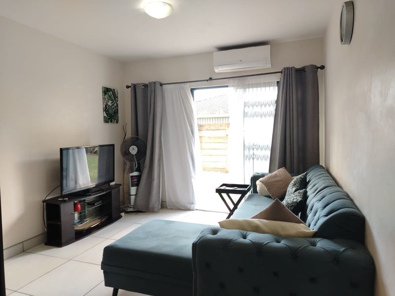 Neat Ground Floor 2 Bedroom Unit in Sought  After CBD Complex - Photo 8