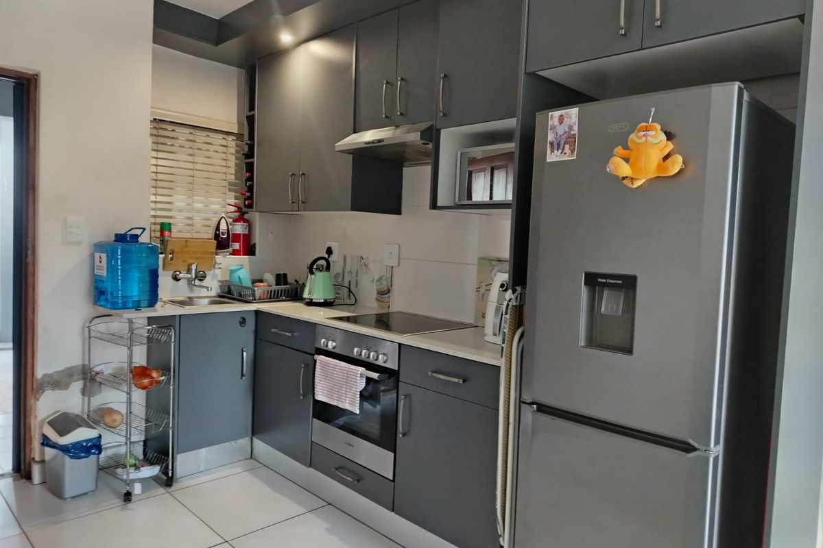 Neat Ground Floor 2 Bedroom Unit in Sought  After CBD Complex - Photo 3