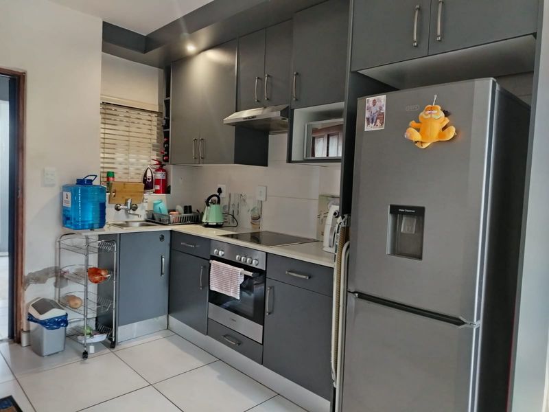 Neat Ground Floor 2 Bedroom Unit in Sought  After CBD Complex - Photo 3