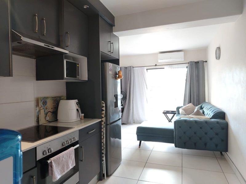 Neat Ground Floor 2 Bedroom Unit in Sought  After CBD Complex - Photo 4