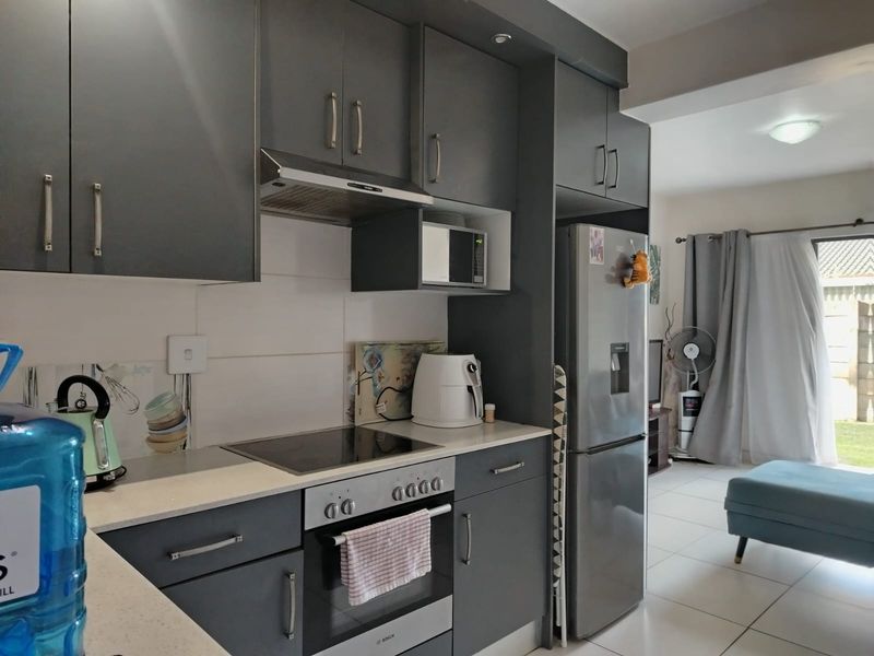 Neat Ground Floor 2 Bedroom Unit in Sought  After CBD Complex - Photo 5