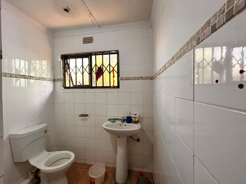 Prime Investment Opportunity with 6 Bedroom Income Generating Property - Photo 6