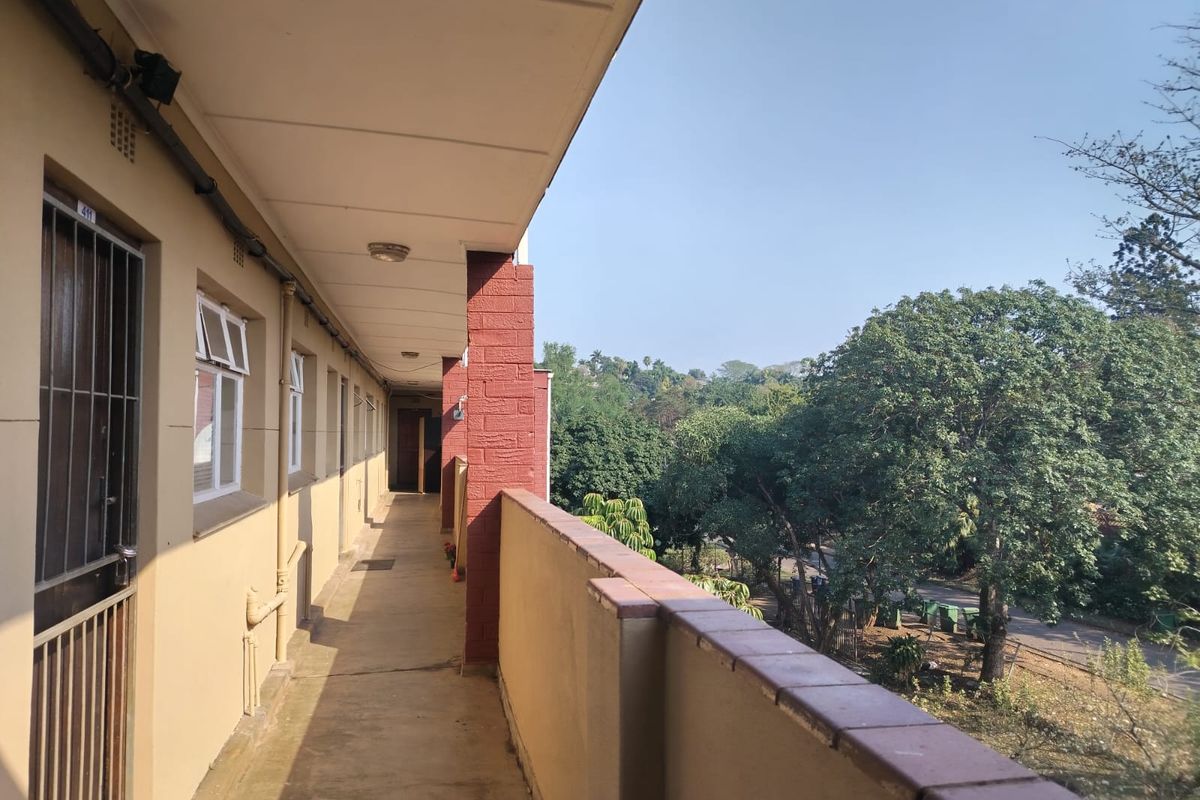 Neat as a Pin Top Floor Unit - Photo 3