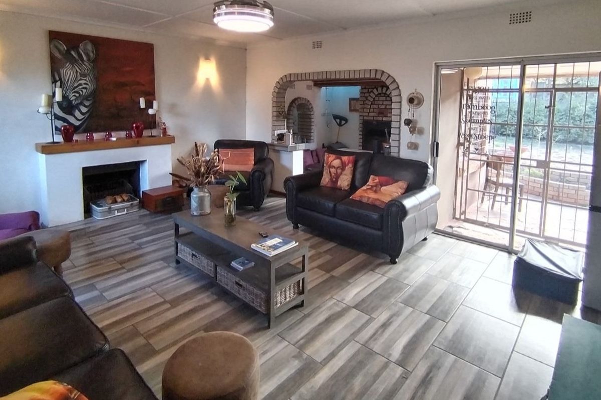 NEAT FAMILY HOME ON A LARGE STAND - Photo 2
