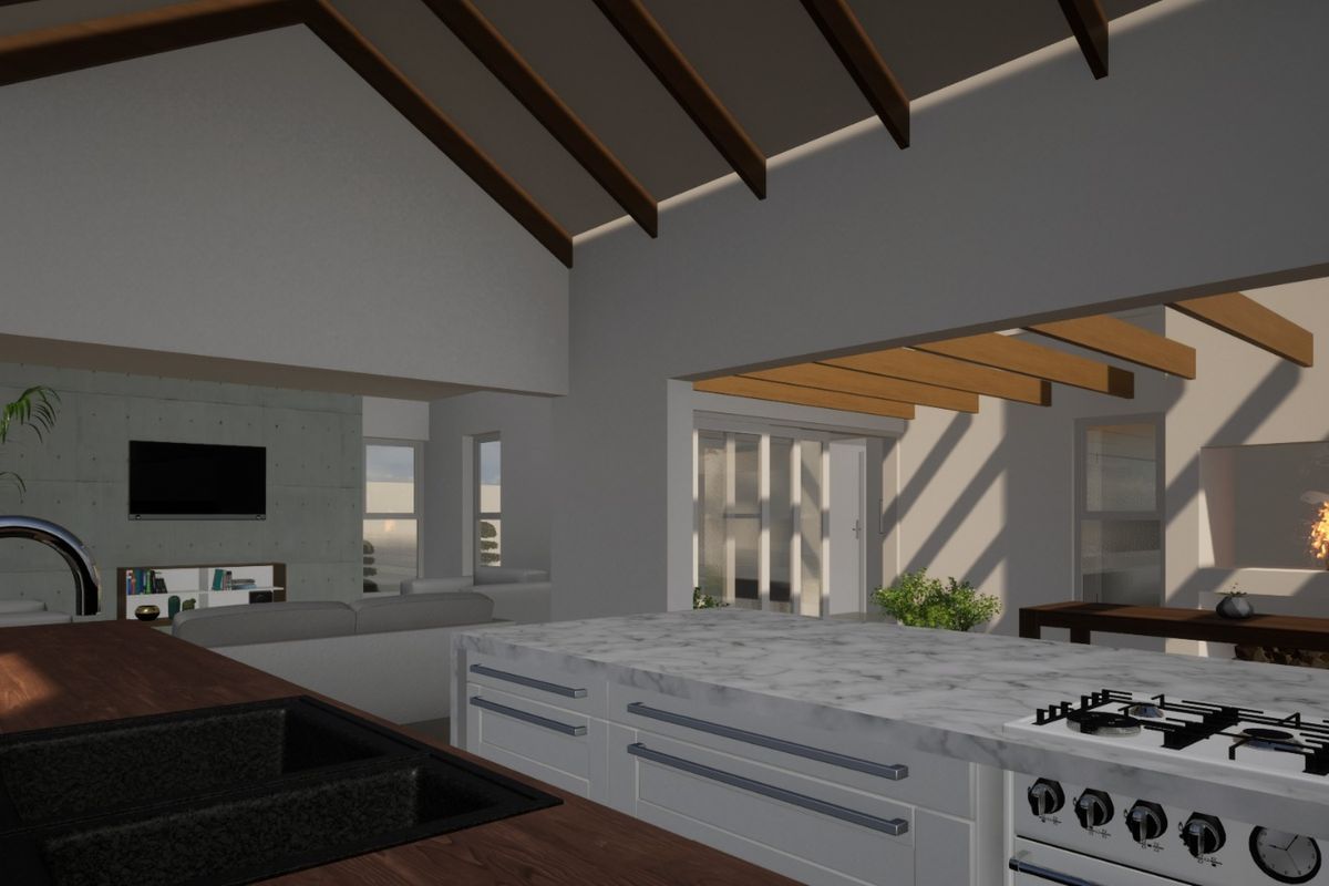 Spacious open-plan living area featuring a modern kitchen with marble island, vaulted ceilings with exposed beams, and a cozy built-in fireplace.