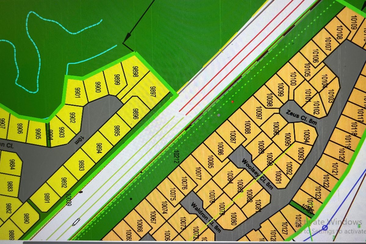 A digital site plan showing the layout of residential plots within the estate, including street names and individual lot numbering.
