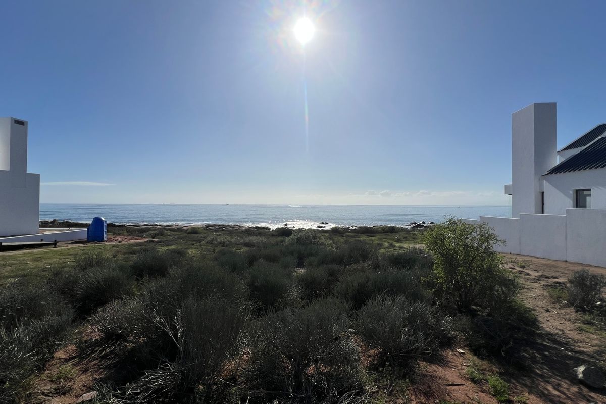 A scenic view of the ocean from the residential property, showcasing the coastal landscape and proximity to the shoreline.