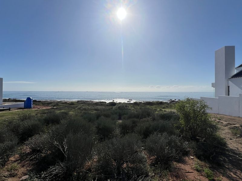 A scenic view of the ocean from the residential property, showcasing the coastal landscape and proximity to the shoreline.