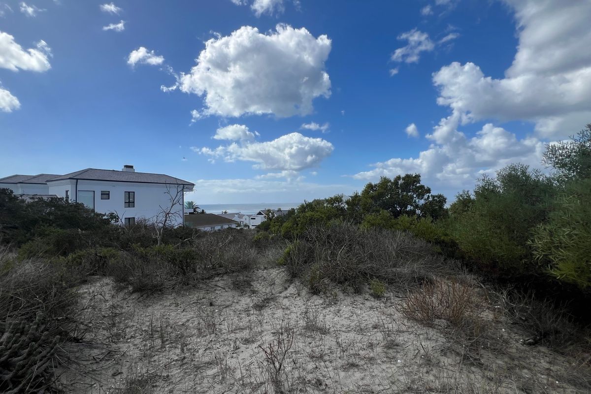 A view of the coastal landscape and surrounding residential properties from the vacant residential land.