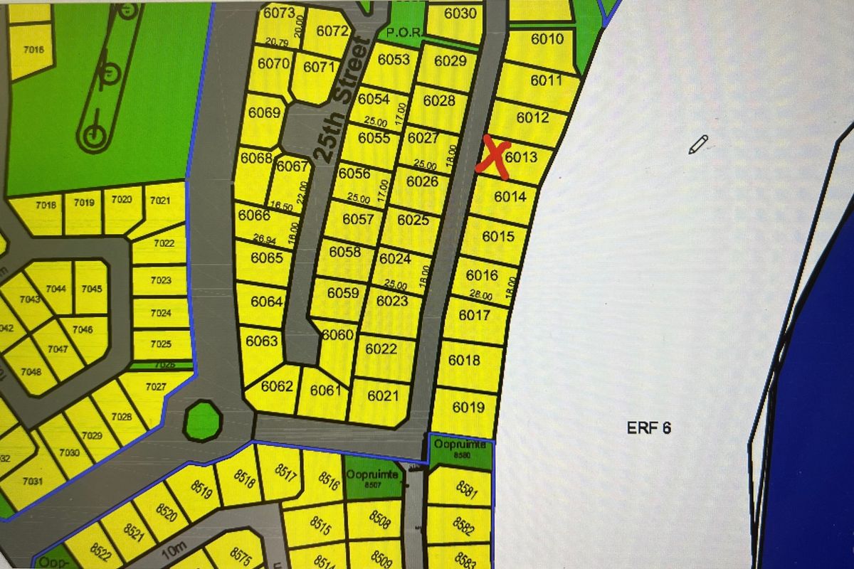A digital cadastral map showing the layout of residential plots, with a red 'X' marking the specific location of the subject property.