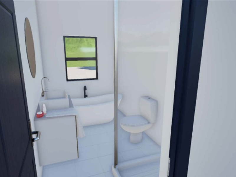A modern, minimalist bathroom featuring a freestanding bathtub, a vanity basin, a toilet, and a glass-enclosed shower.