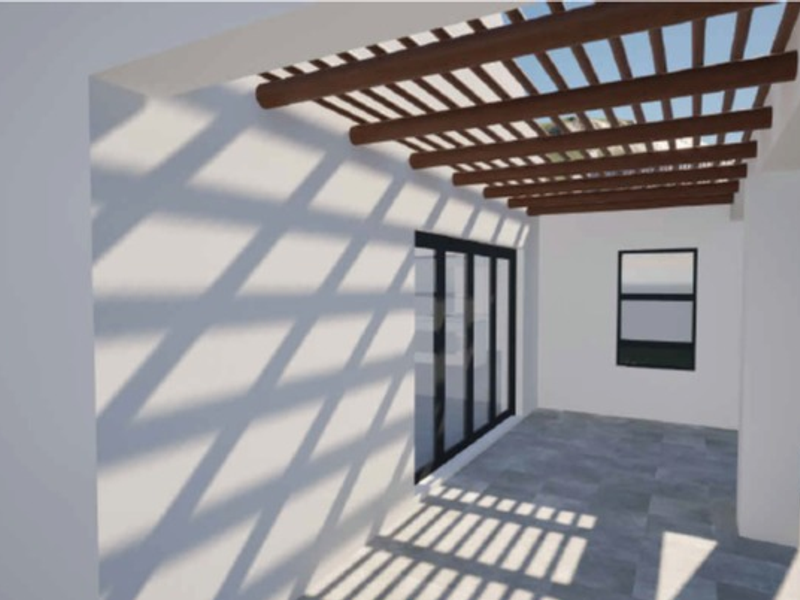 A modern covered patio area featuring a timber pergola, tiled flooring, and large sliding glass doors providing access to the interior.