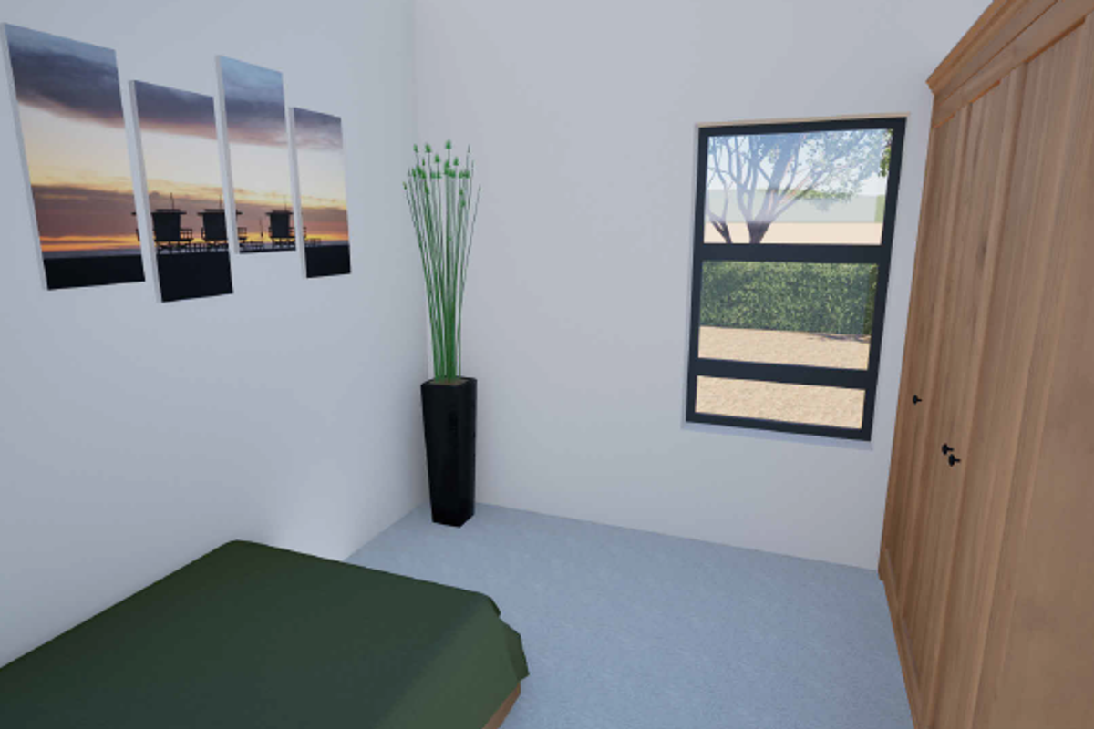 A bedroom featuring a built-in wooden wardrobe and a window with views of the garden.
