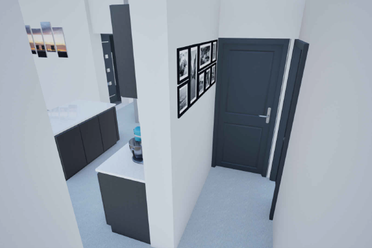 A modern kitchen area featuring dark cabinetry, a central island with stone countertops, and clean, minimalist finishes.